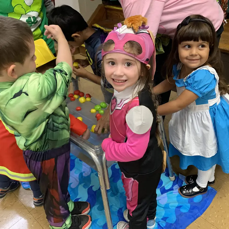 Children enjoying imaginative dress-up and sensory play